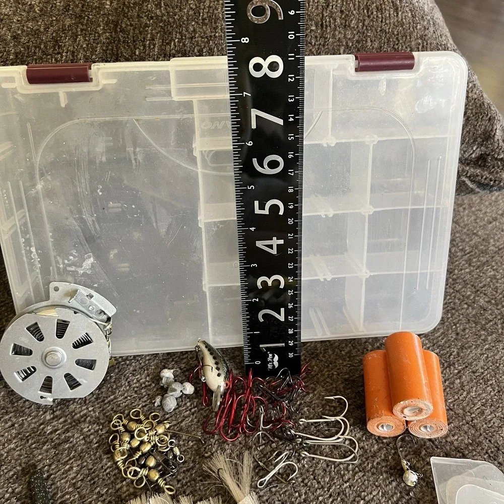 Plano Tackle Box Lot with Rebel Lure Bucktail Jigs Hooks Swivels and Hand Reel